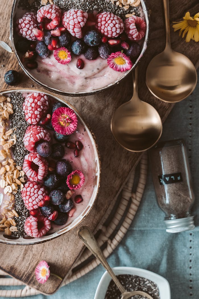 why-choose-us Delicious smoothie bowls topped with fresh berries, perfect for a healthy breakfast.